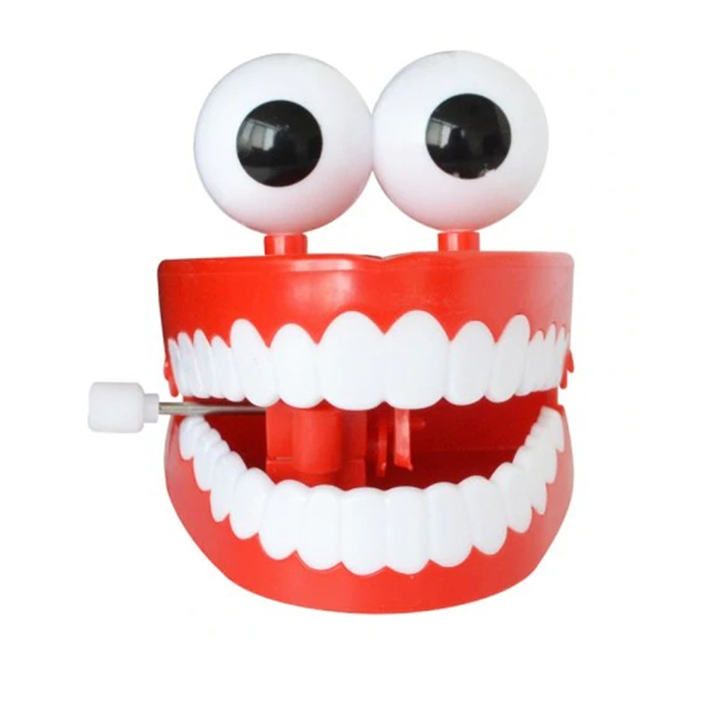 1Pc-Clockwork-Jumping-Teeth-Red-Wind-Up-Funny-Mouth-Tooth-With-Eyes-Flashing-Novelties-Trick-Toys-1441349-1